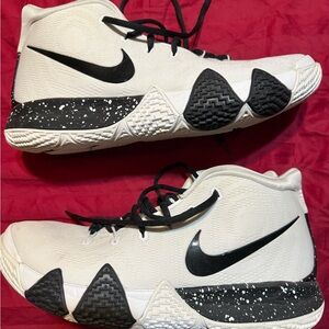 Nike “Kyrie” White and Black Athletic Shoes